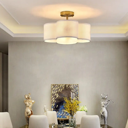 Gold 4-Light Ceiling Fixture by Decorbites, a flush mount ceiling light with white fabric shades on Tampa Home & Garden Store