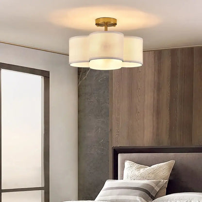 Gold 4-Light Ceiling Fixture flush mount with brass finish and white drum shades Decorbites on Tampa Home & Garden Store