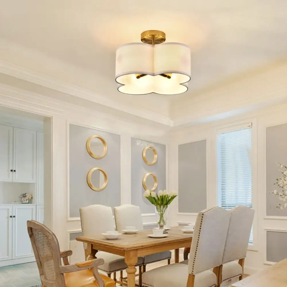 Gold 4-Light Flush Mount Ceiling Fixture by Decorbites with white curved shade on Tampa Home & Garden Store