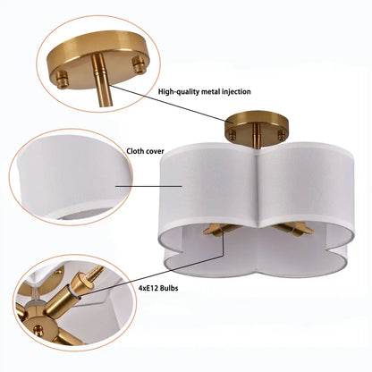 Gold metal 4-light ceiling flush mount by Decorbites with white fabric shades on Tampa Home & Garden Store
