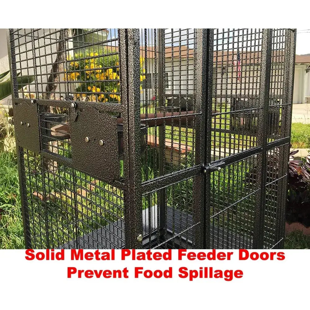 Black wrought iron bird cage with solid metal plated feeder doors and heavy mesh panels on Tampa Home & Garden Store