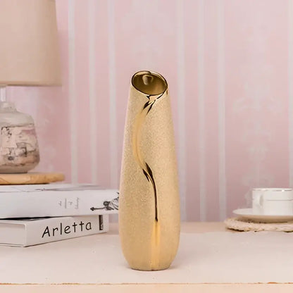 Gold cream ceramic vase, tall slender with a gold swirl accent and textured finish on Tampa Home & Garden Store