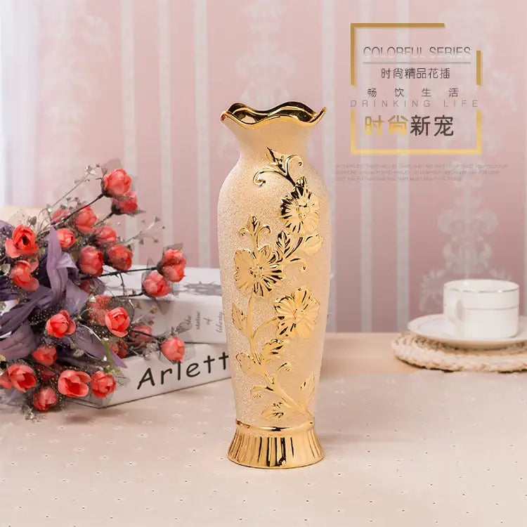 Gold cream ceramic vase with floral relief, wavy gold rim by Decorbites on Tampa Home & Garden Store