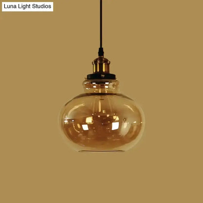 Farmhouse brass pendant light with amber glass globe Decorbites on Tampa Home & Garden Store