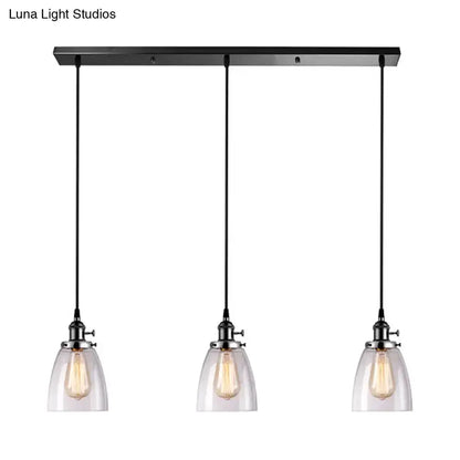 Farmhouse black 3-light pendant light with clear glass shades on linear canopy Decorbites on Tampa Home & Garden Store