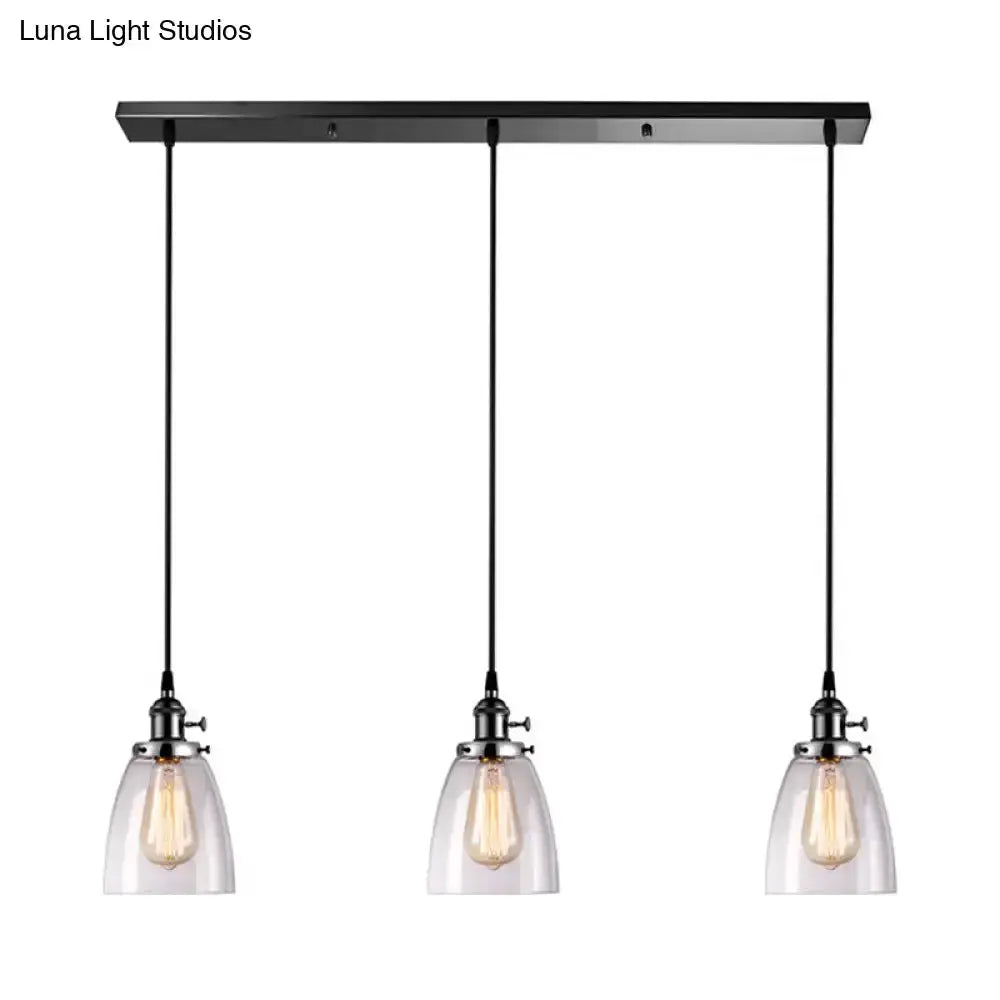 Decorbites farmhouse black 3-light pendant light with clear glass shades and a linear canopy on Tampa Home & Garden Store