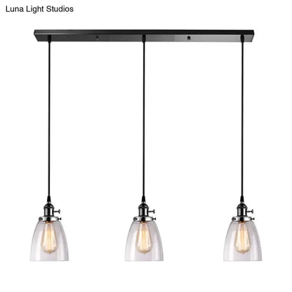 Decorbites farmhouse black 3-light pendant light with clear glass shades and a linear canopy on Tampa Home & Garden Store