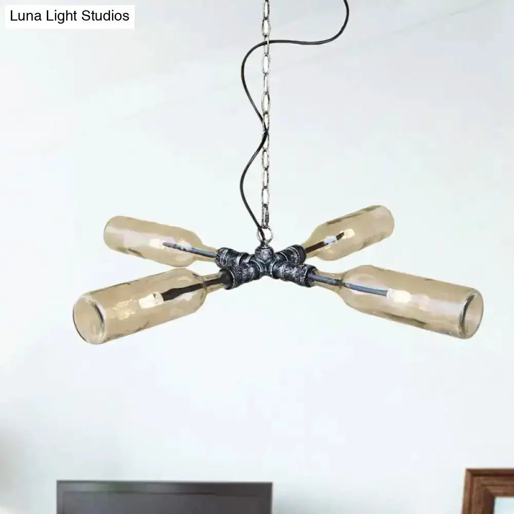 Farmhouse four-bottle chandelier aged silver with smoke gray-blue glass bottles on Tampa Home & Garden Store