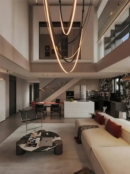 Modern flexible leather belt LED chandelier with amber loops in living room by Decorbites on Tampa Home & Garden Store
