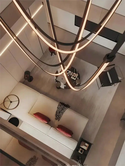 Decorbites flexible leather belt LED chandelier, curved warm-white dining pendant light on Tampa Home & Garden Store