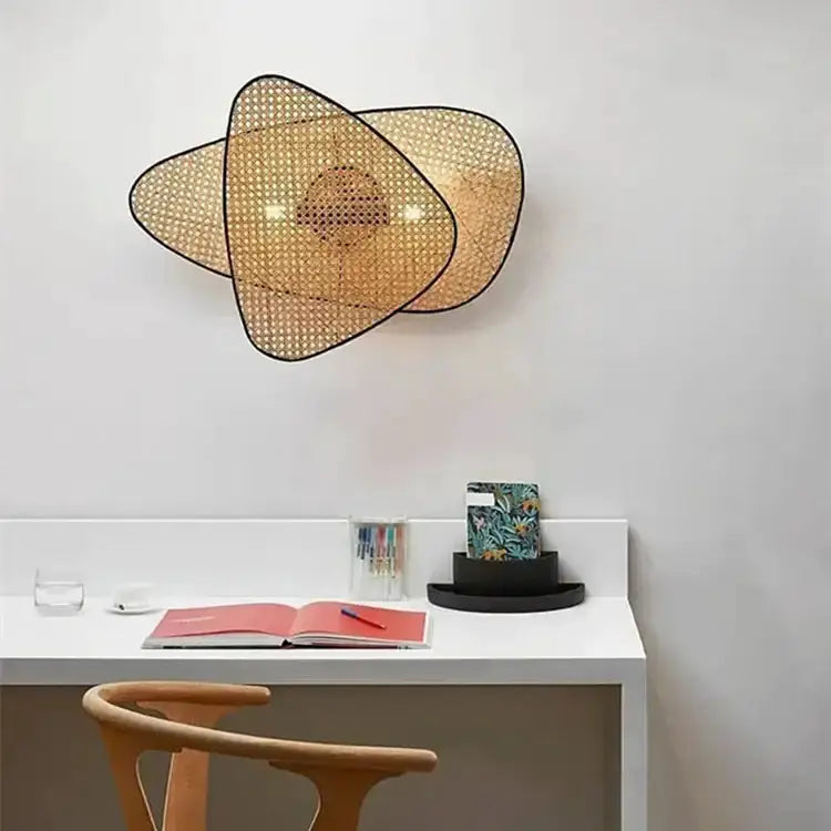 Decorbites chandelier dining pendant in natural tan rattan with three overlapping petal shapes on Tampa Home & Garden Store