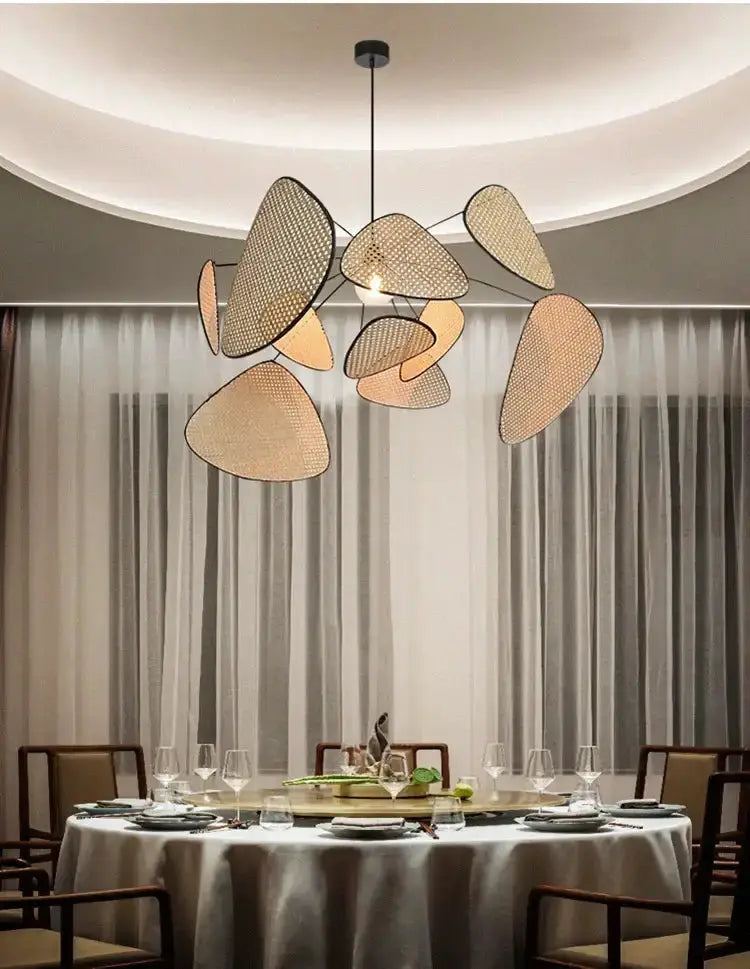 Chandelier pendant light with natural tan woven rattan panels in leaves, French design on Tampa Home & Garden Store