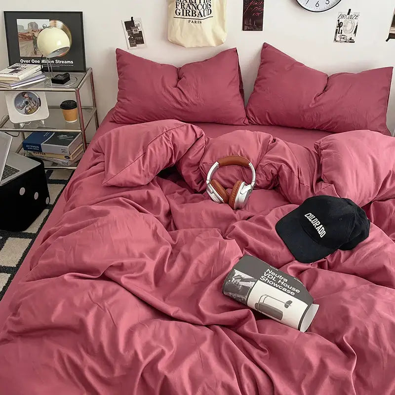 Cream Plush Quilt Set pink bedding on a bed with pink pillows and headphones on Tampa Home & Garden Store