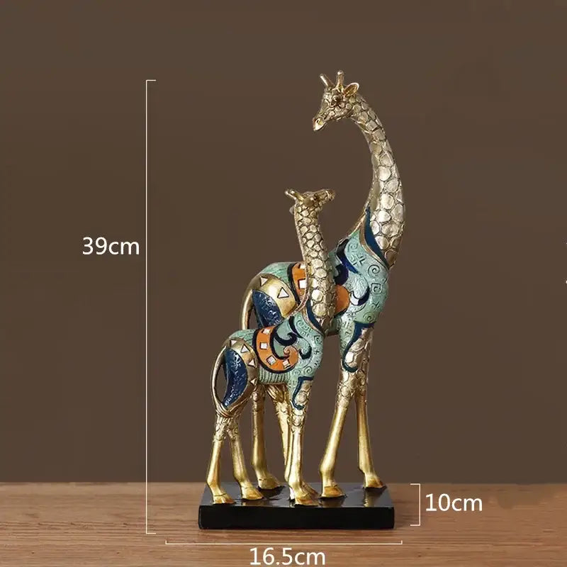 Modern teal and gold mother-and-calf sculpture by Decorbites for interior decor on pedestal on Tampa Home & Garden Store