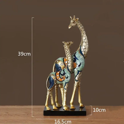 Modern teal and gold mother-and-calf sculpture by Decorbites for interior decor on pedestal on Tampa Home & Garden Store