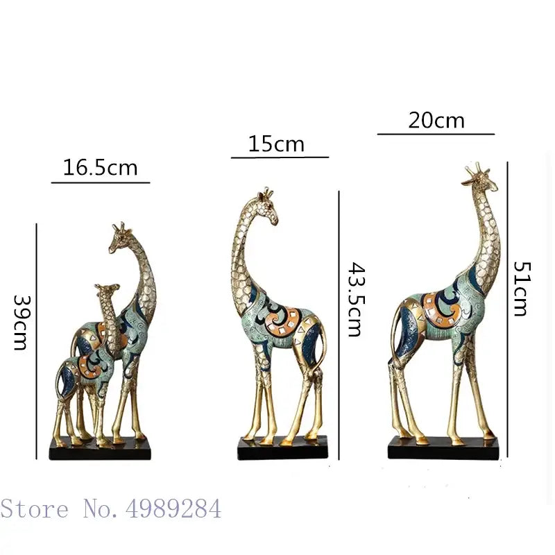 Decorbites teal & gold giraffe sculpture set with mother and two calves on black bases on Tampa Home & Garden Store