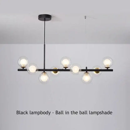 Black Glass Ceiling Chandelier with globe bulbs along a horizontal bar by Decorbites on Tampa Home & Garden Store