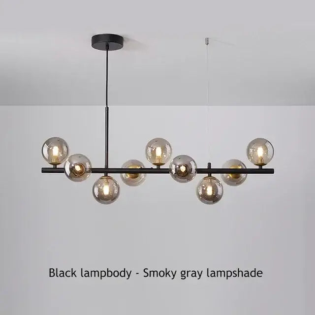 Black glass chandelier by Decorbites with smoky gray globe bulbs, linear ceiling fixture on Tampa Home & Garden Store