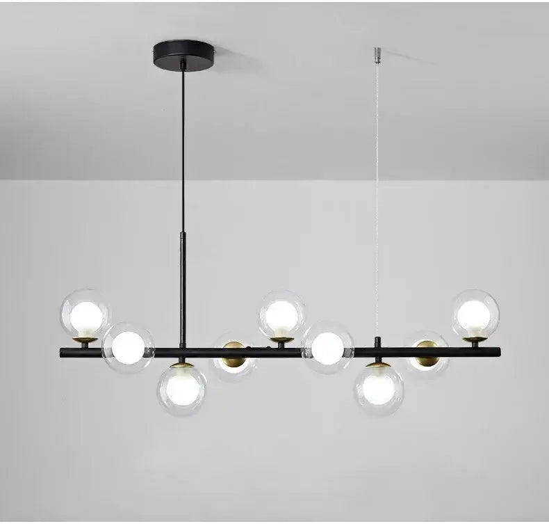 Chandelier Decorbites gold-accent glass ball ceiling pendant with black bar and clear globes on Tampa Home & Garden Store