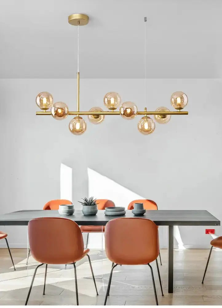 Decorbites gold glass globe chandelier with amber bulbs for dining room on Tampa Home & Garden Store