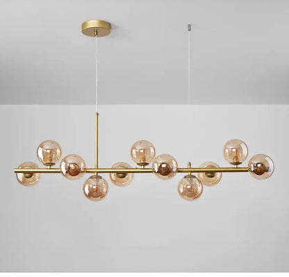 Modern gold glass ball chandelier, linear pendant light with globe bulbs by Decorbites on Tampa Home & Garden Store