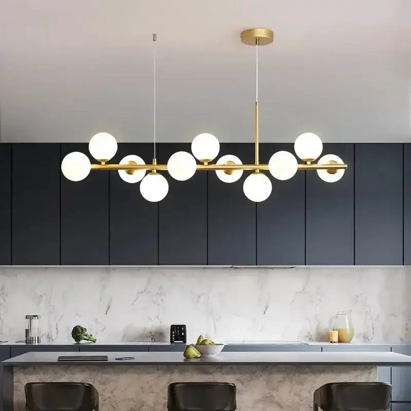 Chandelier Decorbites modern gold glass ball chandelier with white globes over kitchen island on Tampa Home & Garden Store