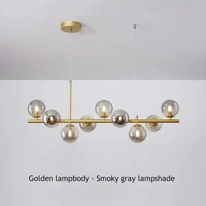 Modern black glass ball chandelier by Decorbites with brass bar and glass globes on Tampa Home & Garden Store