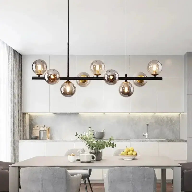Decorbites modern gold glass ball chandelier with black bar and cognac globes for dining on Tampa Home & Garden Store