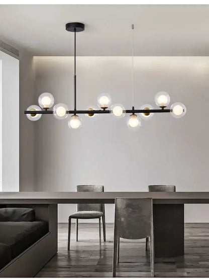 Chandelier Decorbites black glass ball chandelier with clear globes above dining area on Tampa Home & Garden Store