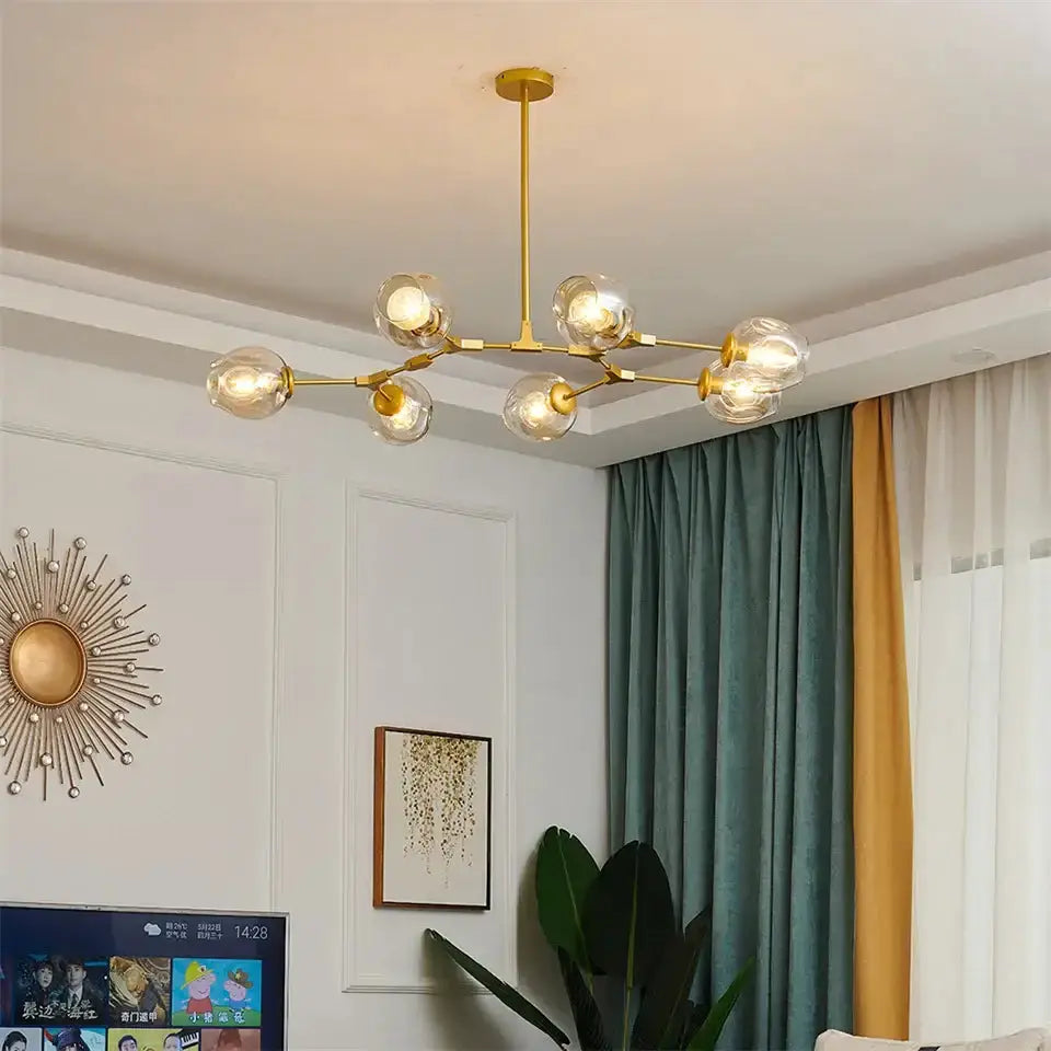 Decorbites Nordic clear glass ball LED chandelier with brass frame and multiple globe bulbs on Tampa Home & Garden Store
