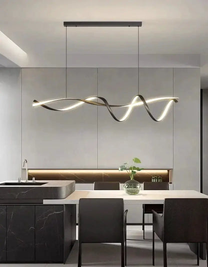 Modern black and gold wave LED glass pendant light chandelier over marble island Decorbites on Tampa Home & Garden Store