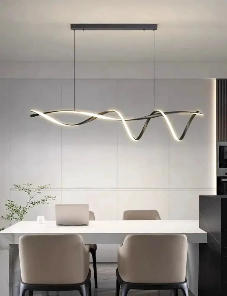 Modern black & gold wave LED glass pendant light chandelier by Decorbites over dining table on Tampa Home & Garden Store