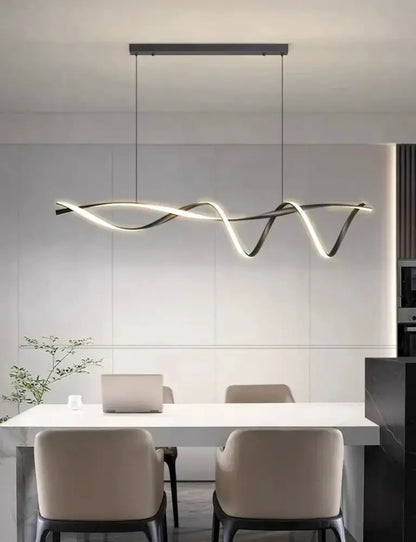 Modern black & gold wave LED glass pendant light chandelier by Decorbites over dining table on Tampa Home & Garden Store