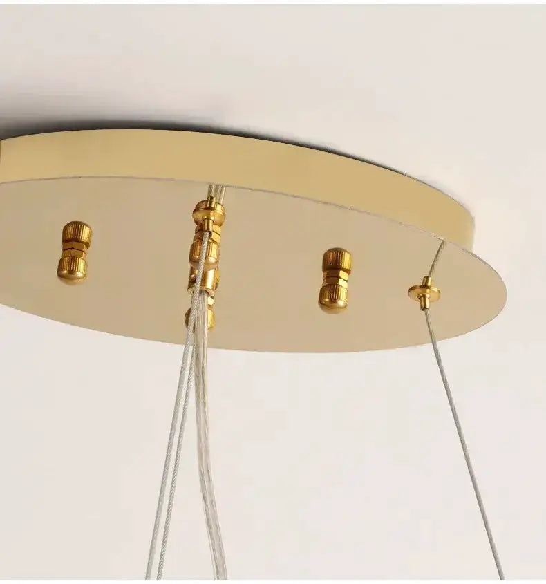 Chandelier modern gold crystal LED branch with hanging cords over a round ceiling plate on Tampa Home & Garden Store