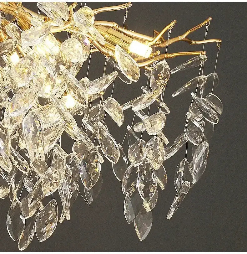 Modern gold LED branch chandelier by Decorbites; gold branches adorned with crystal prisms on Tampa Home & Garden Store