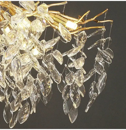 Modern gold LED branch chandelier by Decorbites; gold branches adorned with crystal prisms on Tampa Home & Garden Store