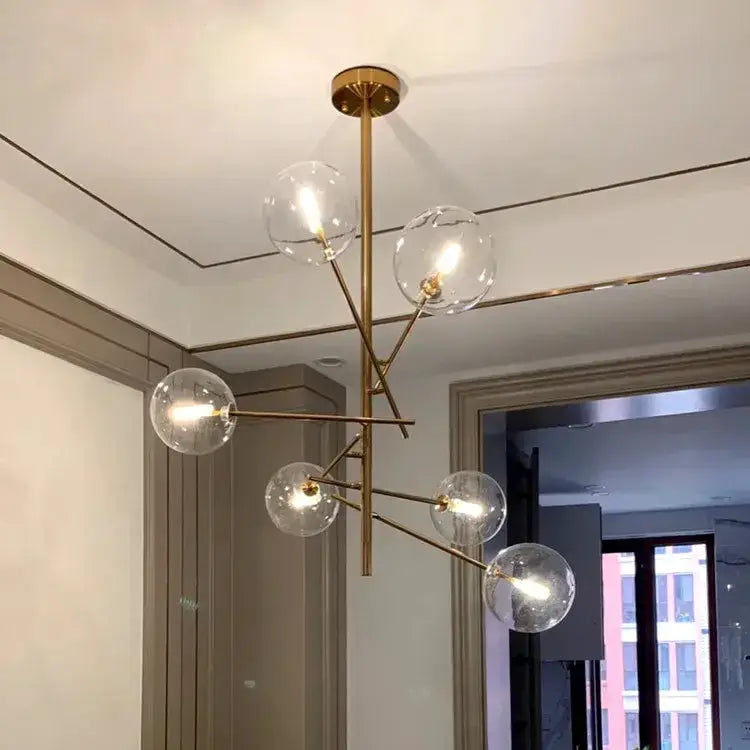 Modern gold glass bubble starburst chandelier with clear globes, dining room light by Decorbites on Tampa Home & Garden Store