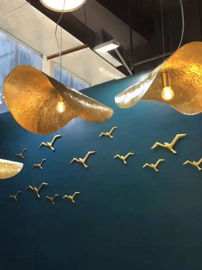 Modern gold lotus leaf pendant light by Decorbites, oversized petal chandelier for dining on Tampa Home & Garden Store