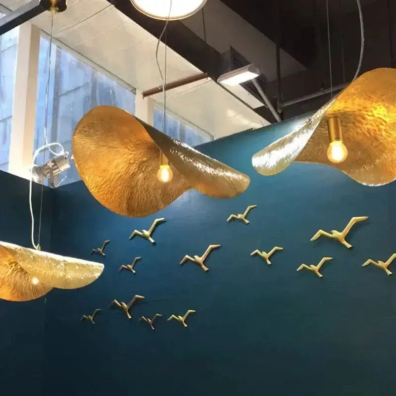 Modern gold lotus leaf pendant lights, trio for dining room by Decorbites on Tampa Home & Garden Store