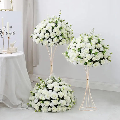 Two gold trumpet vase stands with lush white rose arrangements by Decorbites on Tampa Home & Garden Store