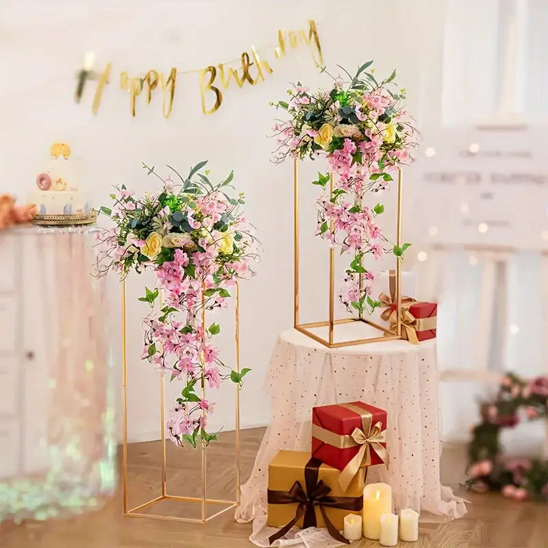 Two gold metal flower stands with cascading pink blossoms, Decorbites vase decor on Tampa Home & Garden Store