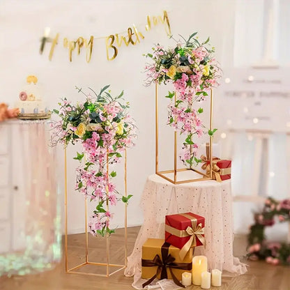 Two gold metal flower stands with cascading pink blossoms, Decorbites vase decor on Tampa Home & Garden Store