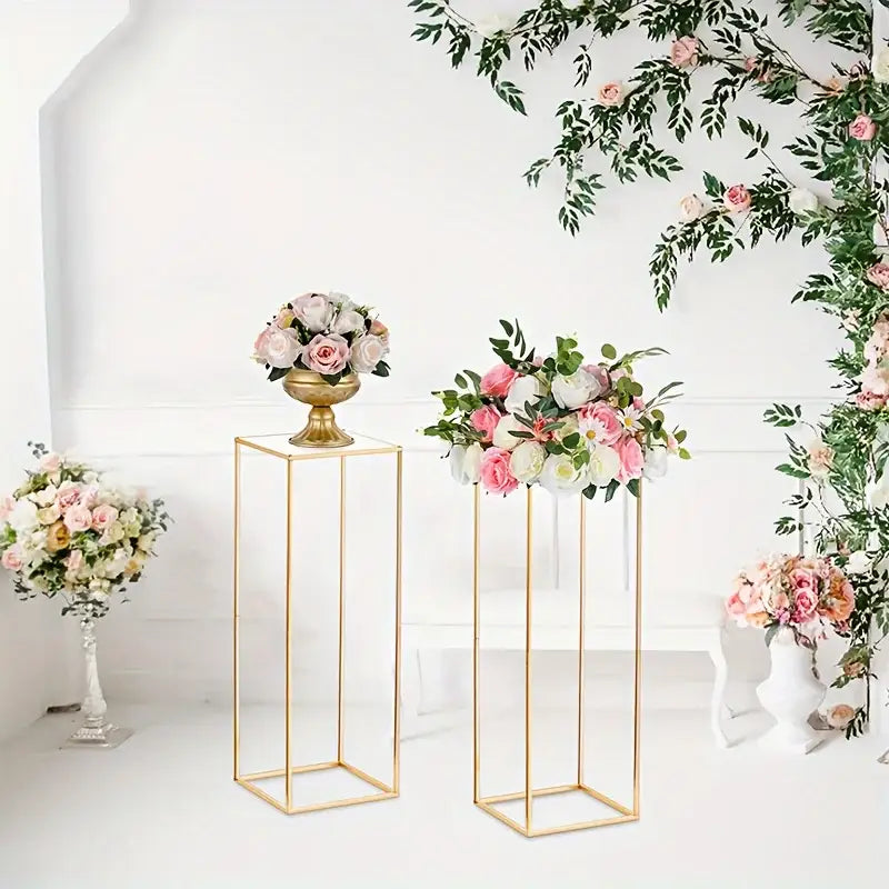 Two gold metal flower stands with pink and white blooms, Decorbites on Tampa Home & Garden Store