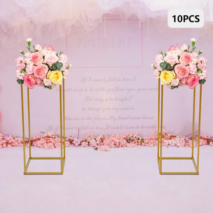 Pair of gold metal flower stands, 23-inch tall, with pink and yellow bouquets Decorbites on Tampa Home & Garden Store
