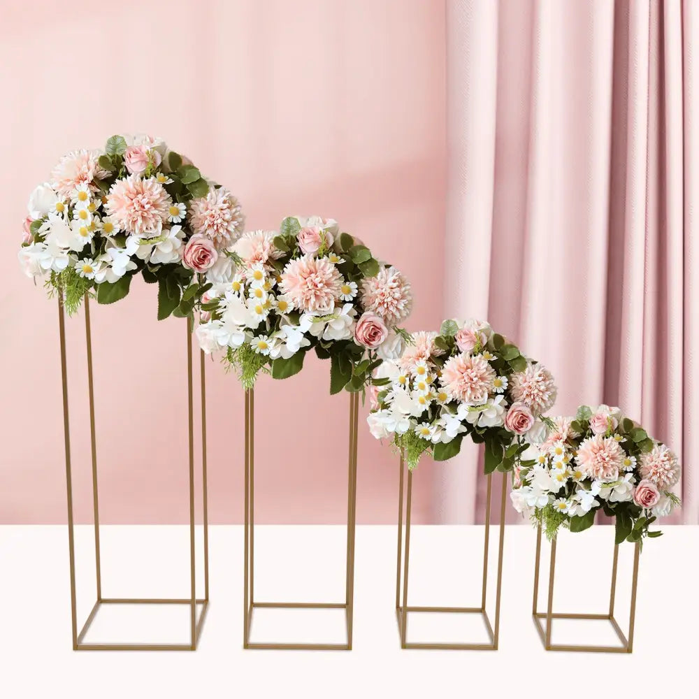 Gold wedding vase stand with pink roses and white daisies on slim gold geometric frames on Tampa Home & Garden Store