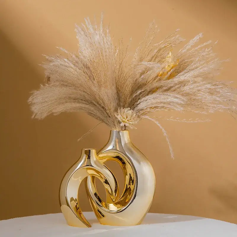 Golden Ceramic Flower Vase by Decorbites, sculptural interlocking rings, pampas grass on Tampa Home & Garden Store