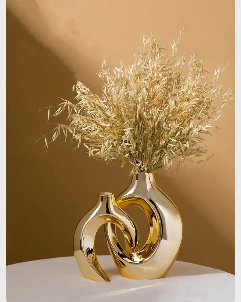 Golden ceramic flower vase set of 2 with mirrored curves by Decorbites on Tampa Home & Garden Store