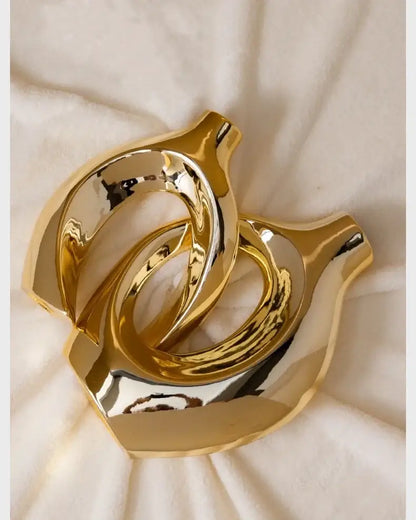 Golden ceramic flower vase by Decorbites, sculptural interlocking rings design on Tampa Home & Garden Store