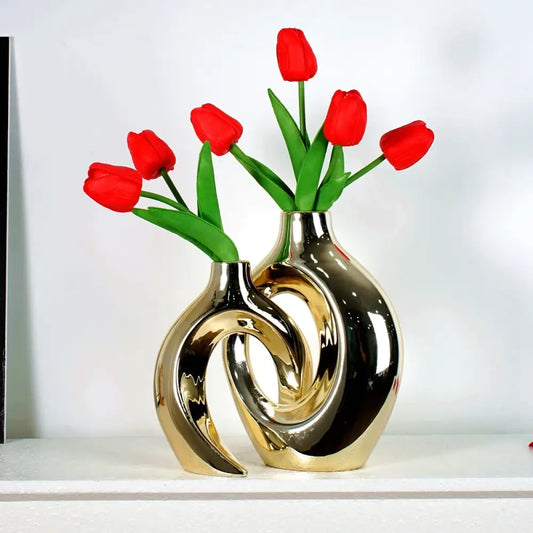 Golden ceramic flower vase set by Decorbites; two interlocking gold vases with red tulips on Tampa Home & Garden Store