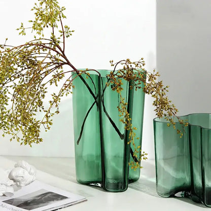 Emerald glass wavy vases pair by Decorbites with dried greenery on Tampa Home & Garden Store